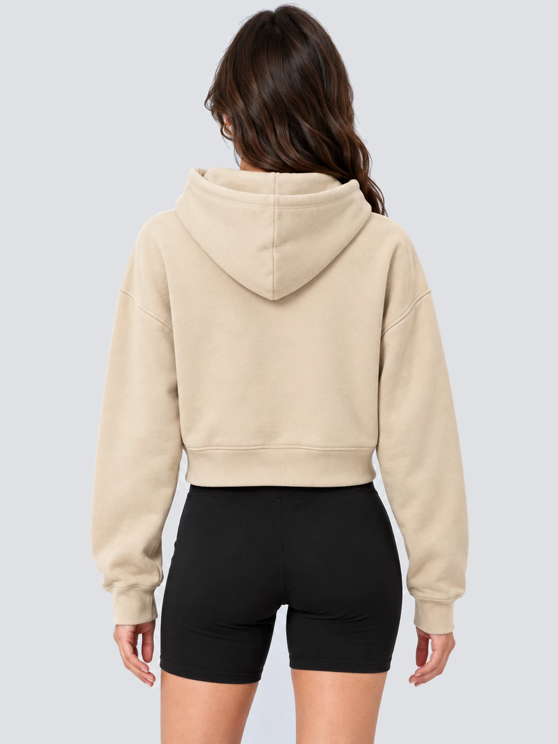 Women's beige cropped pullover hoodie back on model