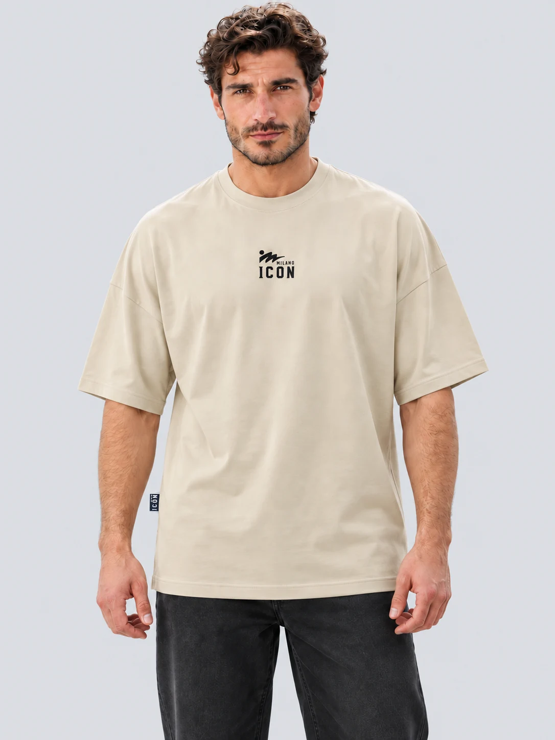 Oversized drop-shoulder T-shirt on a male model