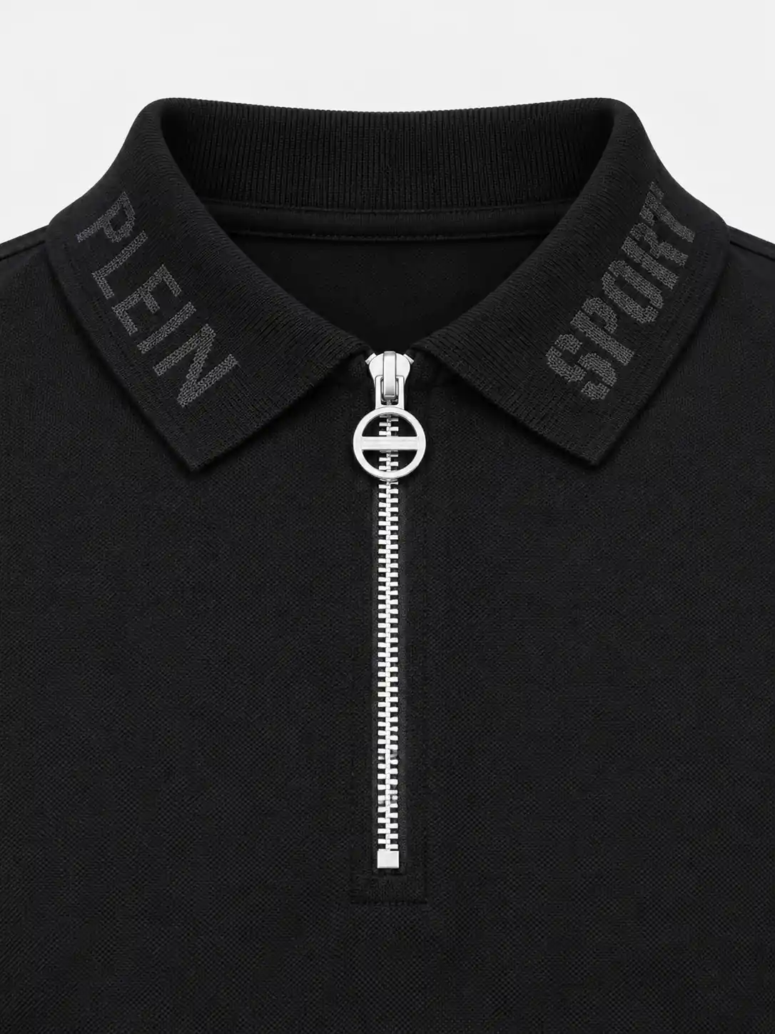 Close-up of tonal logo lettering knitted into a black flat-knit polo collar and a metal neck zipper with ring-shaped pull