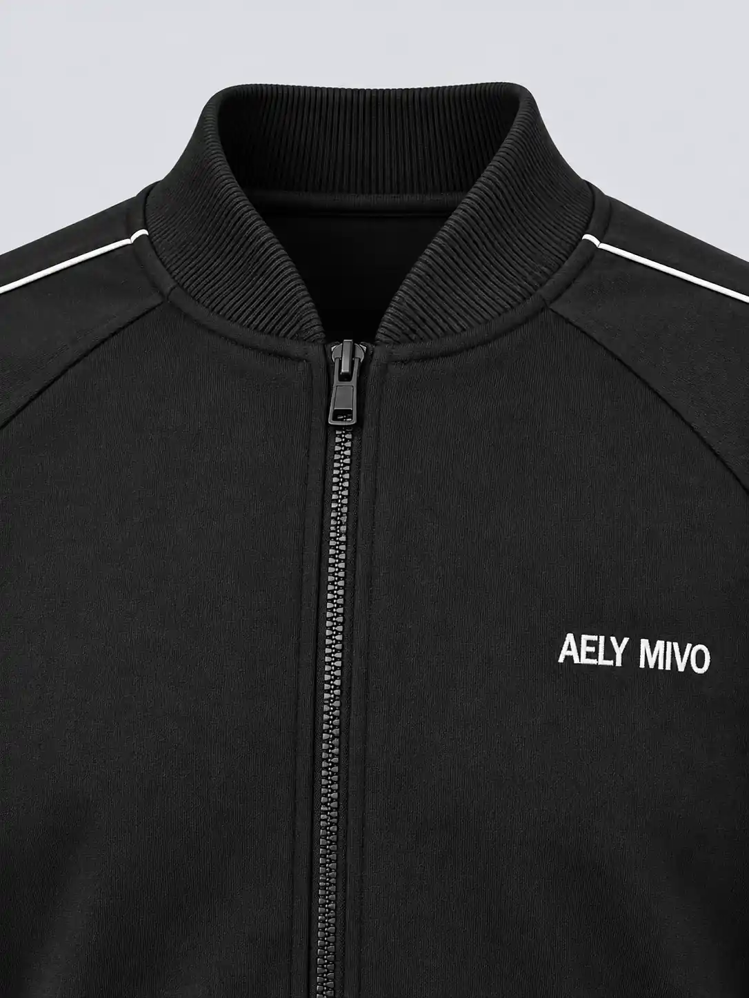 Rib baseball collar, zipper and embroidery detail