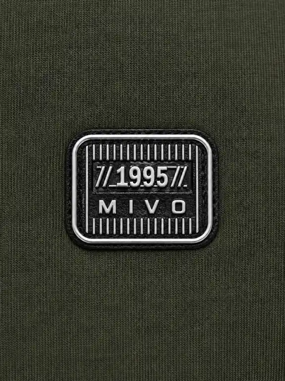 Silver relief leather chest badge