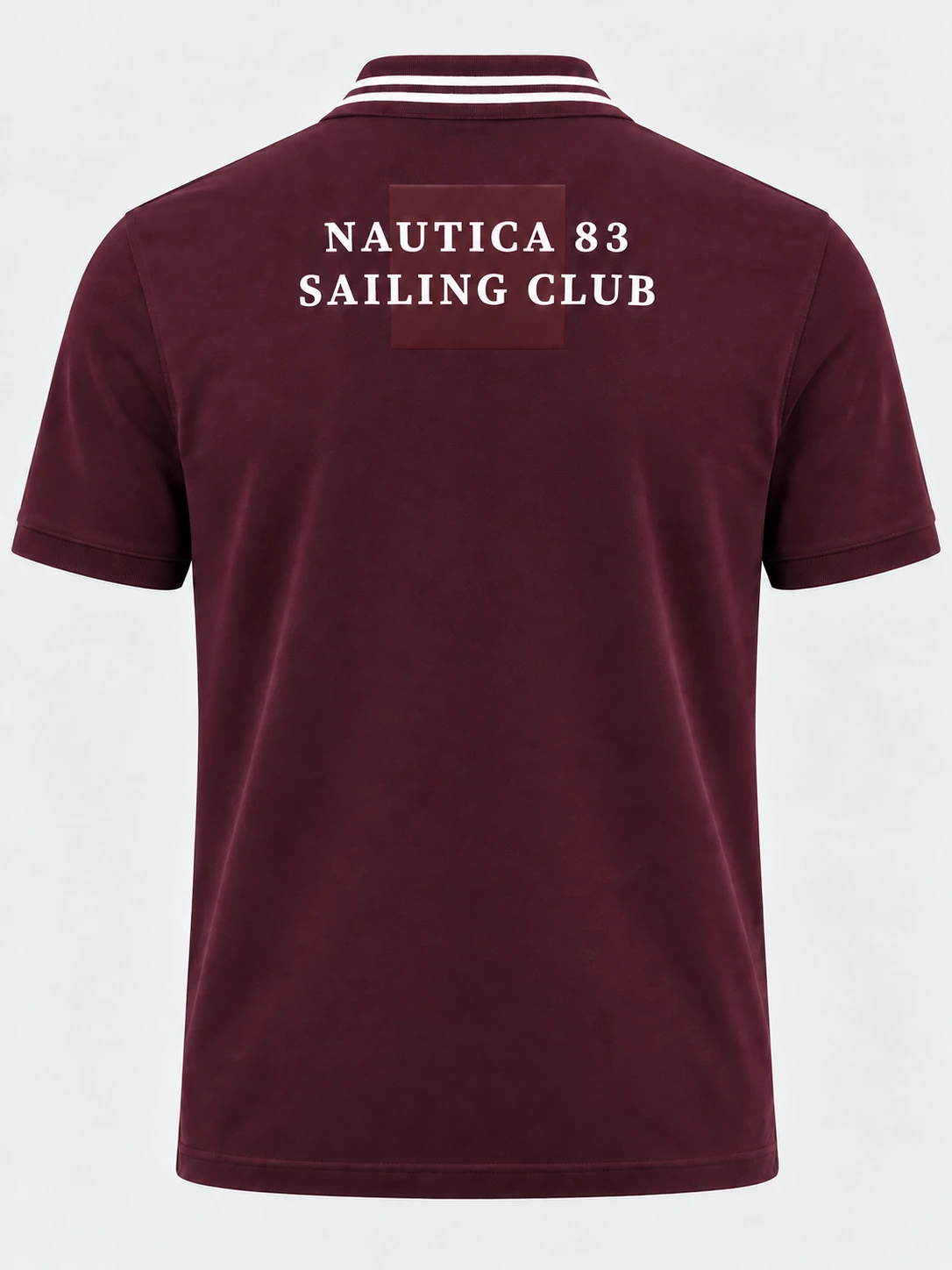 Back of a burgundy cotton-lyocell polo shirt with a tonal rectangular silicone print area and white two-line lettering