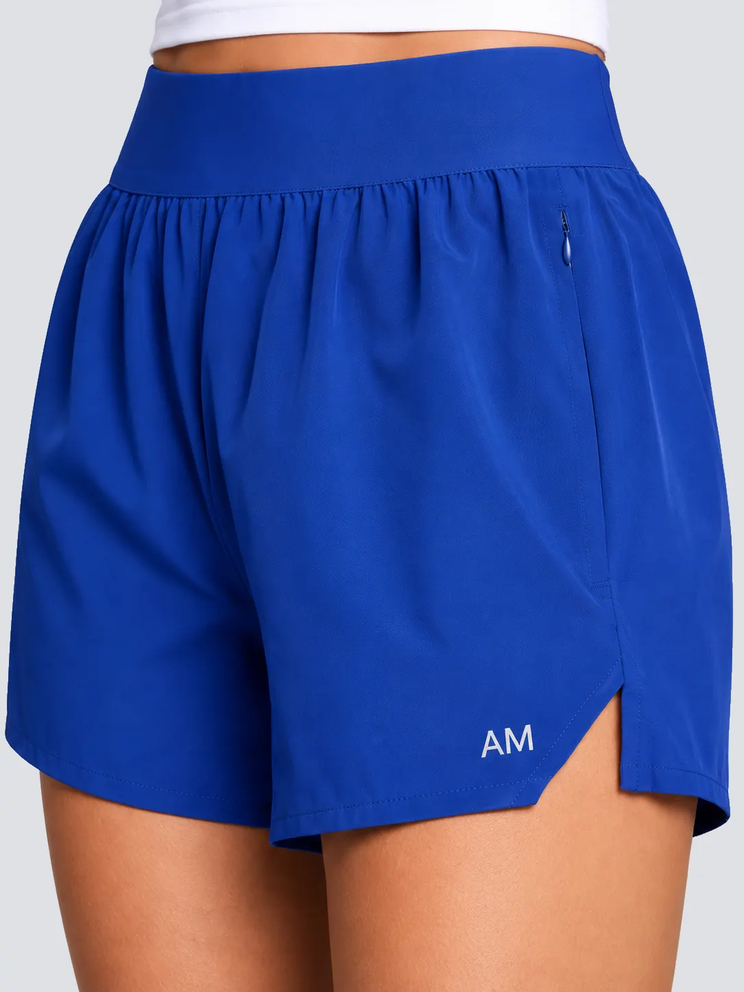 Running shorts waistband, zipper pocket and side-split detail