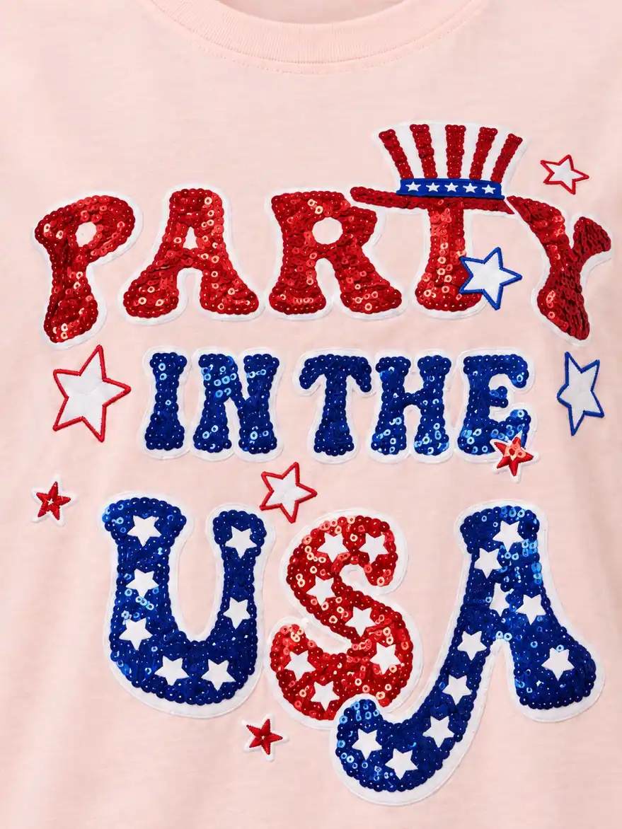 Red and blue sequin-filled lettering with white borders and contrasting embroidered star outlines