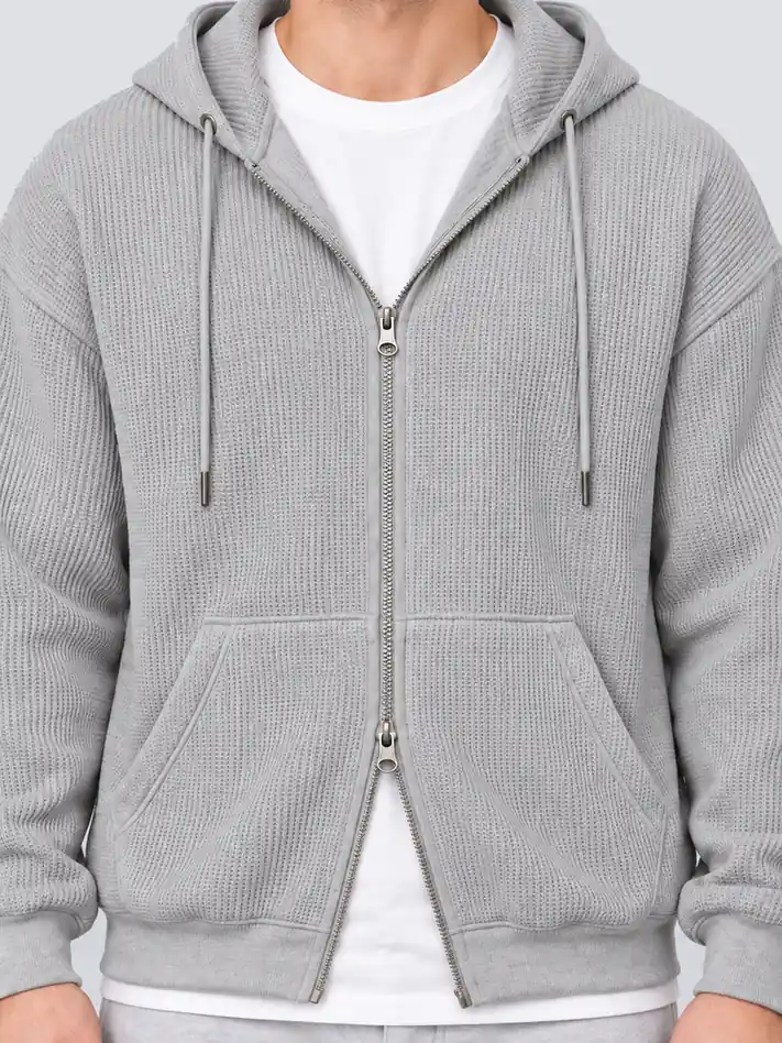 Two-way zipper and knit waffle fabric detail