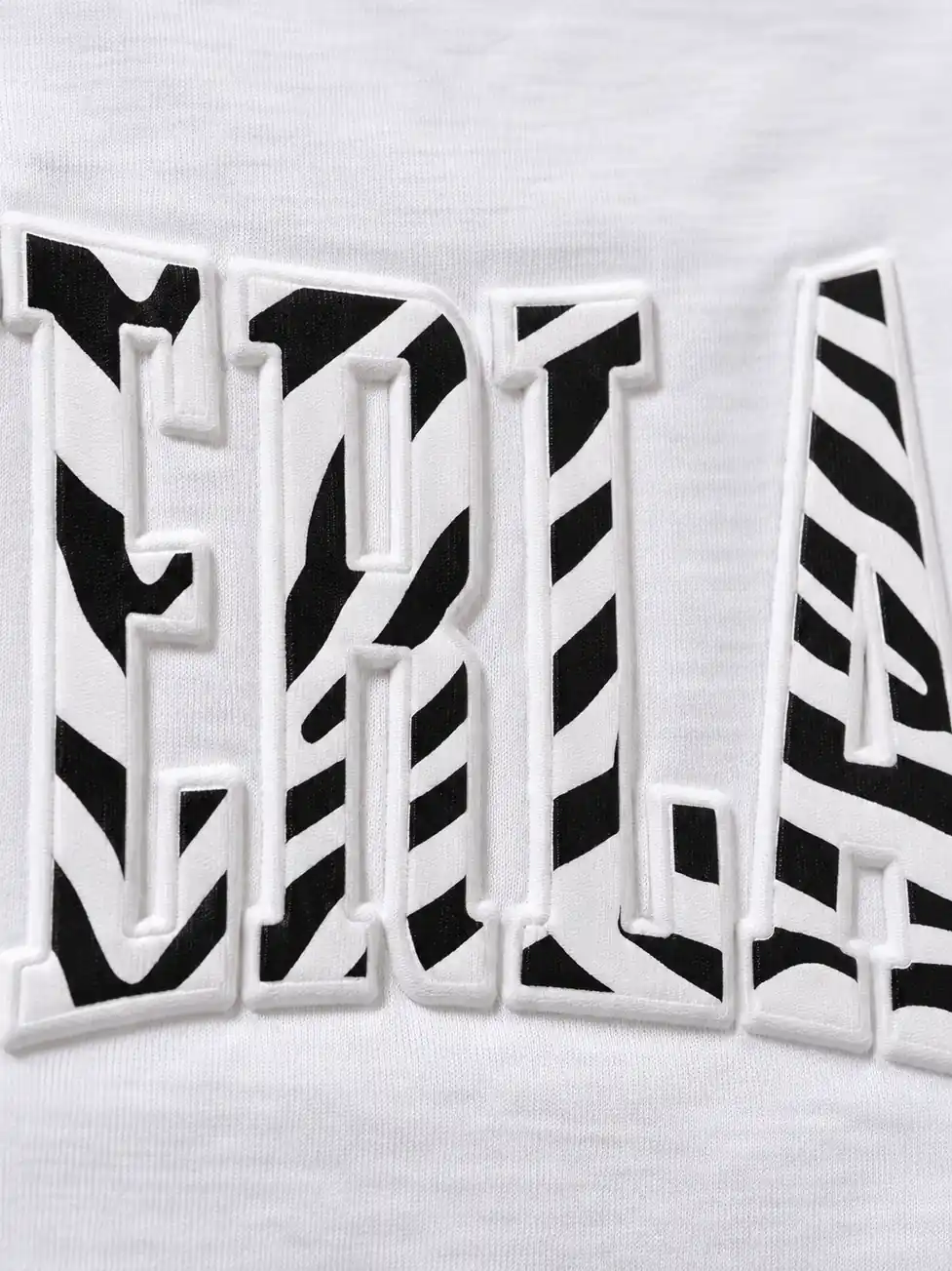 White T-shirt embossed letter detail