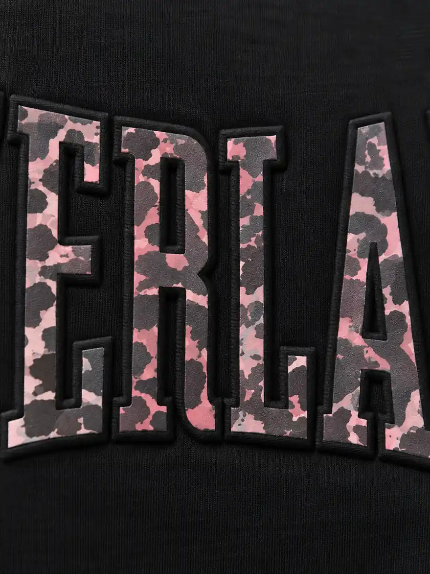 Black T-shirt embossed letter detail
